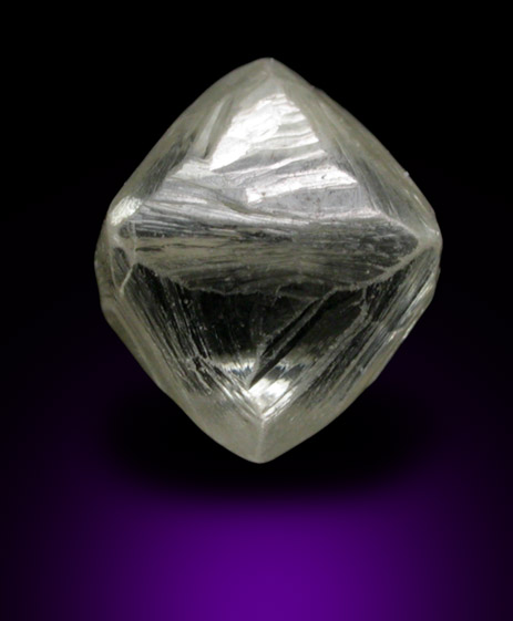 Diamond (1.17 carat pale yellow octahedral crystal) from Oranjemund District, southern coastal Namib Desert, Namibia