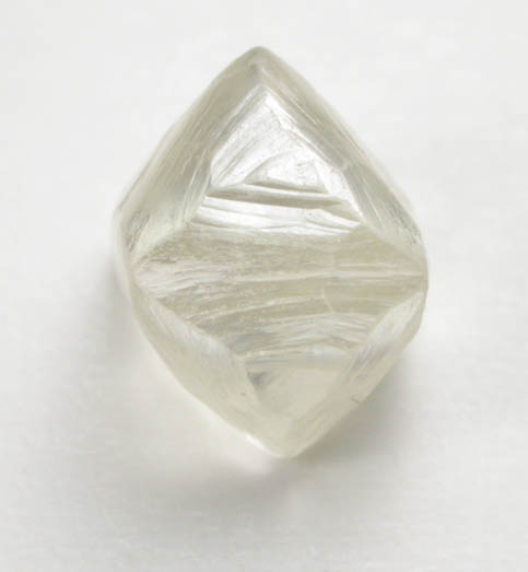 Diamond (1.17 carat pale yellow octahedral crystal) from Oranjemund District, southern coastal Namib Desert, Namibia