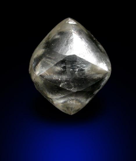 Diamond (0.65 carat pale yellow octahedral crystal) from Damtshaa Mine, near Orapa, Botswana