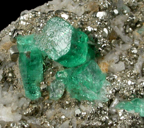 Beryl var. Emerald in Calcite with Pyrite from Chivor Mine, Guavió-Guateque District, Boyacá Department, Colombia