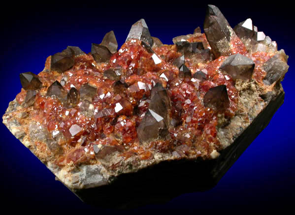 Spessartine Garnet on Smoky Quartz and Microcline from Wushan Spessartine Mine, Tongbei-Yunling District, Fujian Province, China