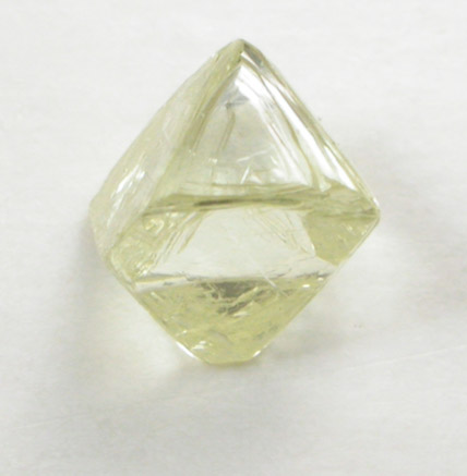 Diamond (0.37 carat yellow octahedral crystal) from Oranjemund District, southern coastal Namib Desert, Namibia