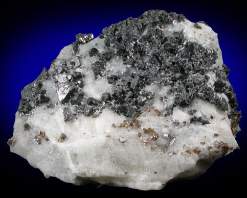 Spinel and Phlogopite in Franklin Marble from Lime Crest Quarry (Limecrest), Sussex Mills, 4.5 km northwest of Sparta, Sussex County, New Jersey