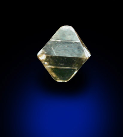 Diamond (0.08 carat pale-brown octahedral crystal) from Mirny, Republic of Sakha, Siberia, Russia