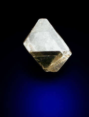 Diamond (0.09 carat pale-brown octahedral crystal) from Mirny, Republic of Sakha, Siberia, Russia