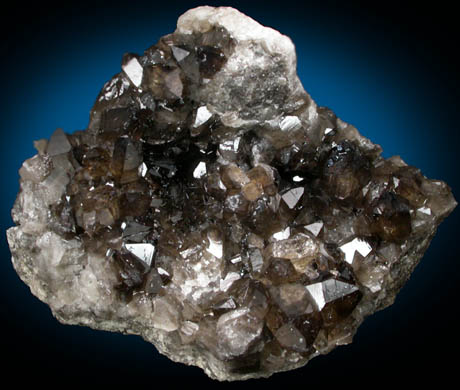 Quartz var. Smoky Quartz on Perthite from Slieve Binian, Mourne Mountains, County Down, Northern Ireland