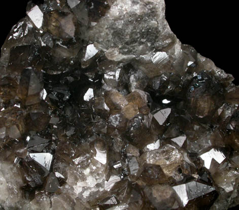 Quartz var. Smoky Quartz on Perthite from Slieve Binian, Mourne Mountains, County Down, Northern Ireland