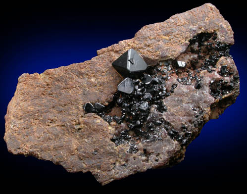 Spinel var. Ferroan Spinel on Forsterite from near Kolonne, Ratnapura District, 20 km NW of Embilipitiya, Sabaragamuwa Province, Sri Lanka