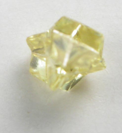 Diamond (0.15 carat fancy intense yellow cavernous crystal) from Mbuji-Mayi (Miba), 300 km east of Tshikapa, Democratic Republic of the Congo