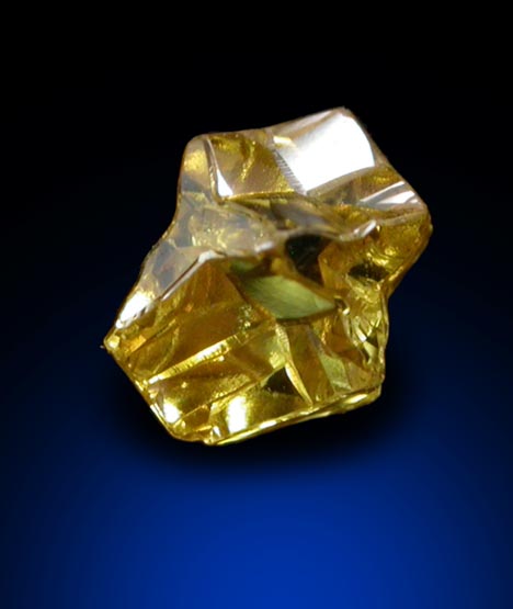 Diamond (0.25 carat fancy intense yellow cavernous crystal) from Mbuji-Mayi (Miba), 300 km east of Tshikapa, Democratic Republic of the Congo