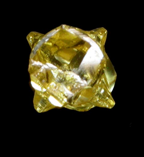 Diamond (0.17 carat fancy intense yellow cavernous crystal) from Mbuji-Mayi (Miba), 300 km east of Tshikapa, Democratic Republic of the Congo