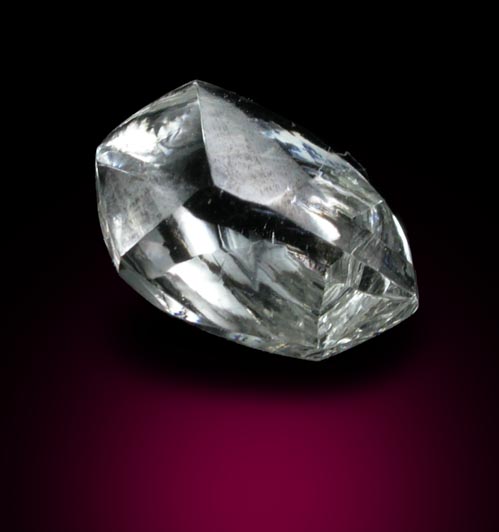 Diamond (0.59 carat cuttable flattened yellow-gray complex crystal) from Orapa Mine, south of the Makgadikgadi Pans, Botswana