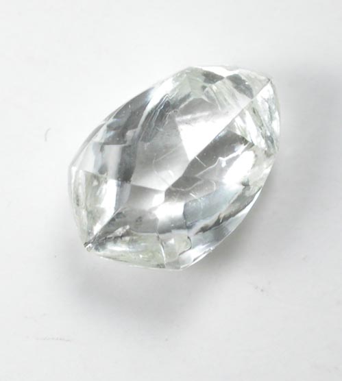 Diamond (0.59 carat cuttable flattened yellow-gray complex crystal) from Orapa Mine, south of the Makgadikgadi Pans, Botswana