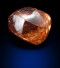 Diamond (0.94 carat fancy-orange dodecahedral crystal) from Oranjemund District, southern coastal Namib Desert, Namibia