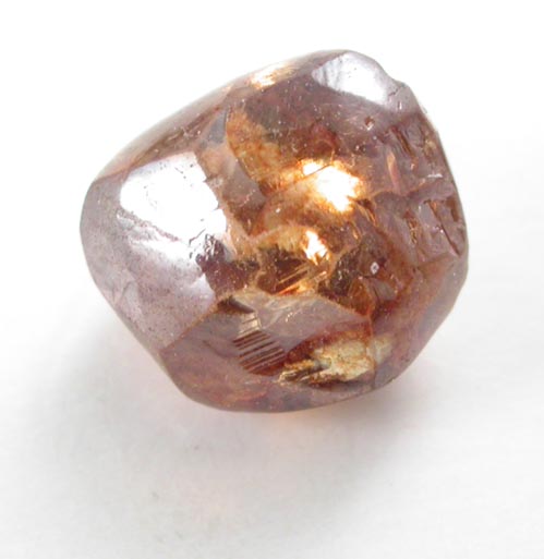 Diamond (0.94 carat fancy-orange dodecahedral crystal) from Oranjemund District, southern coastal Namib Desert, Namibia