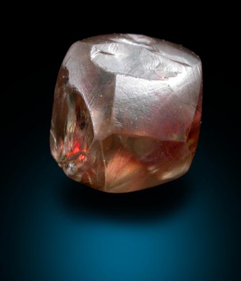 Diamond (1.63 carat brown dodecahedral crystal with red inclusion) from Oranjemund District, southern coastal Namib Desert, Namibia