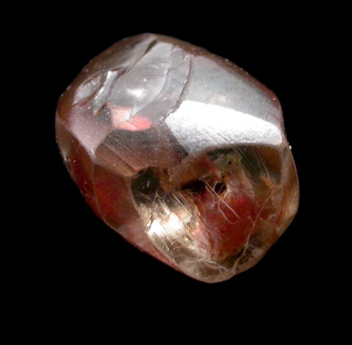 Diamond (1.63 carat brown dodecahedral crystal with red inclusion) from Oranjemund District, southern coastal Namib Desert, Namibia