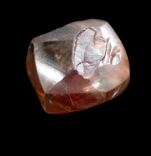 Diamond (1.63 carat brown dodecahedral crystal with red inclusion) from Oranjemund District, southern coastal Namib Desert, Namibia