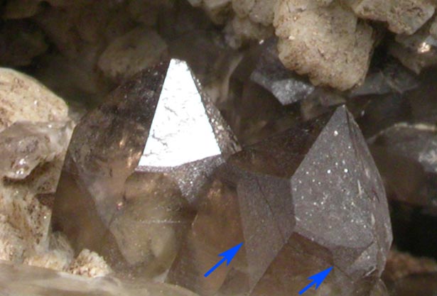 Quartz var. Smoky Quartz (Dauphin-law twins) on Microcline from Moat Mountain, west of North Conway, Carroll County, New Hampshire