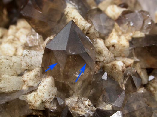 Quartz var. Smoky Quartz (Dauphin-law twins) on Microcline from Moat Mountain, west of North Conway, Carroll County, New Hampshire