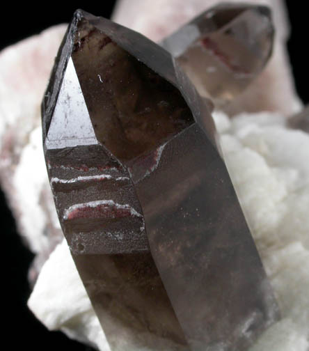 Quartz var. Smoky Quartz on Microcline and Albite from Crystal Peak area, 6.5 km northeast of Lake George, Park-Teller Counties, Colorado