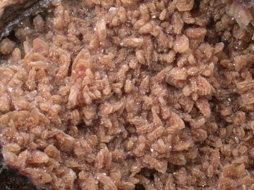 Hemimorphite coated with Calcite with Hematite inclusions from Ahumada Mine, Sierra de Los Lamentos, Chihuahua, Mexico