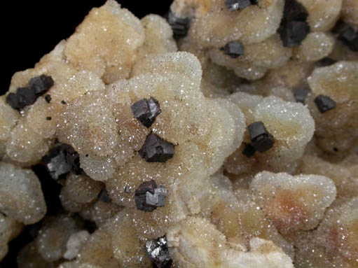 Limonite pseudomorphs after Pyrite on Quartz from Brazil