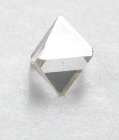 Diamond (0.07 carat pale-brown octahedral crystal) from Mirny, Republic of Sakha, Siberia, Russia