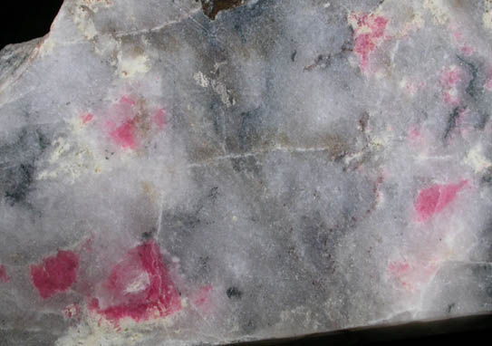 Tugtupite (tenebrescent) from Kuannersuit (Kvanefjeld), Ilimaussaq Complex, Narsaq, Kitaa Province, Greenland