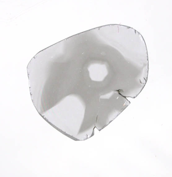 Diamond (0.21 carat polished slice with sector-zoned inclusions) from Zimbabwe