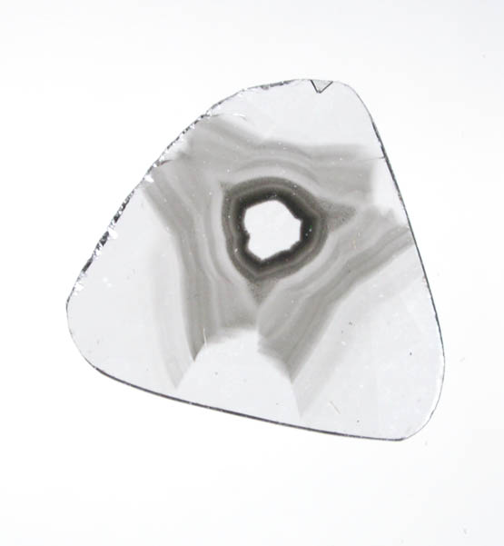 Diamond (0.21 carat polished slice with sector-zoned inclusions) from Zimbabwe