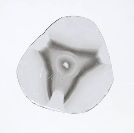 Diamond (0.16 carat polished slice with sector-zoned inclusions) from Zimbabwe