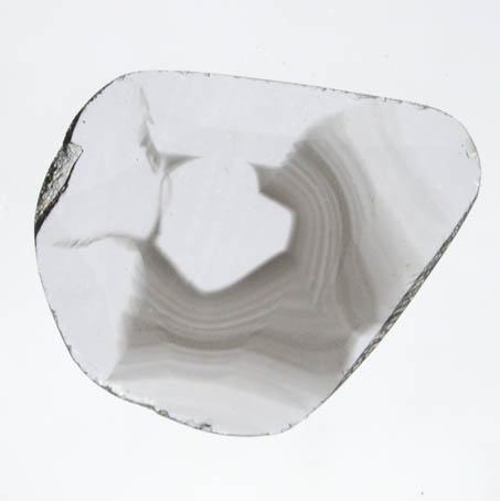 Diamond (0.39 carat polished slice with sector-zoned inclusions) from Zimbabwe