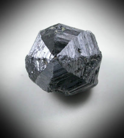 Rutile (eightling twin) from Perovskite Hill, Magnet Cove, Hot Spring County, Arkansas