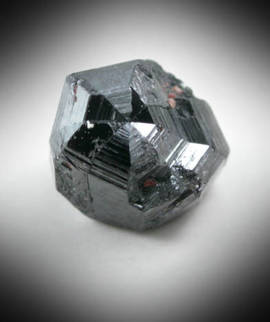Rutile (eightling twin) from Perovskite Hill, Magnet Cove, Hot Spring County, Arkansas
