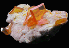 Wulfenite with Mimetite on Barite from Rowley Mine, 20 km northwest of Theba, Painted Rock Mountains, Maricopa County, Arizona