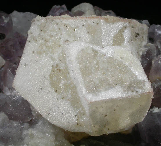 Calcite twinned crystals on Amethyst Quartz from Alto Uruguai, Rio Grande do Sul, Brazil