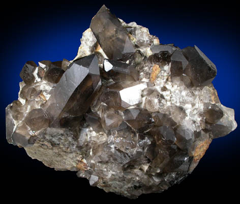 Quartz var. Smoky Quartz (Dauphin-law twins) on Microcline from Moat Mountain, west of North Conway, Carroll County, New Hampshire