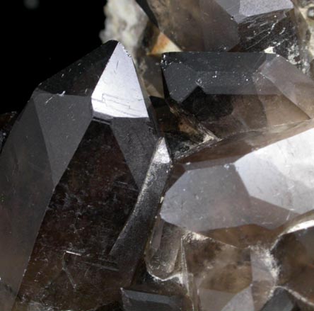 Quartz var. Smoky Quartz (Dauphin-law twins) on Microcline from Moat Mountain, west of North Conway, Carroll County, New Hampshire