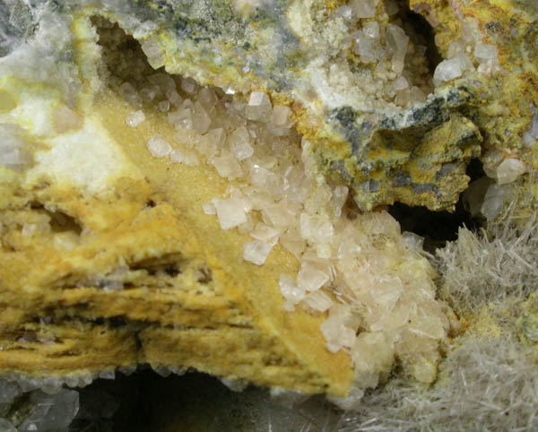 Greenockite on Calcite, Prehnite, Natrolite with quartz casts after Anhydrite from Prospect Park Quarry, Prospect Park, Passaic County, New Jersey
