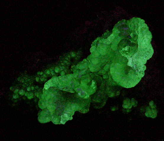 Photo below under shortwave ultraviolet illumination of Opal var. Hyalite from Monok, Zemplén Mountains, Borsod-Abaúj-Zemplén, Hungary Opal var. Hyalite from Monok, Zemplén Mountains, Borsod-Abaúj-Zemplén, Hungary