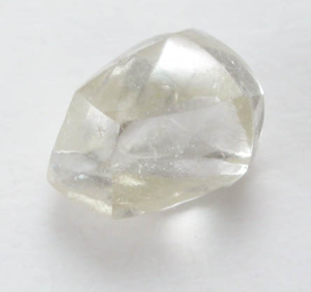Diamond (0.22 carat pale-yellow cuttable elongated dodecahedral crystal) from Oranjemund District, southern coastal Namib Desert, Namibia