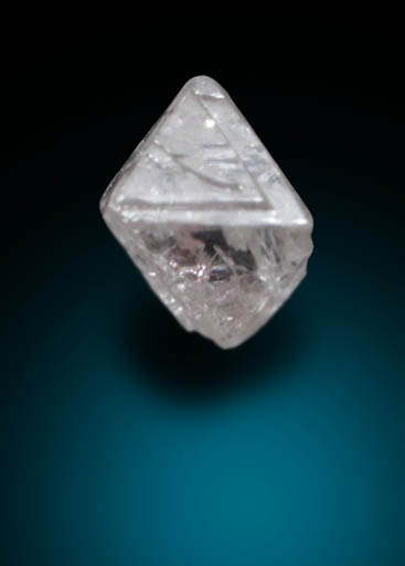 Diamond (0.27 carat pale pink-gray octahedral crystal) from Argyle Mine, Kimberley, Western Australia, Australia