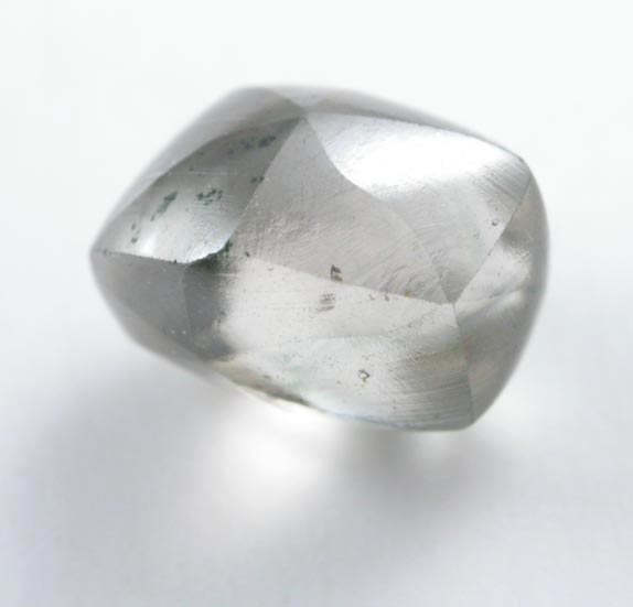 Diamond (1.23 carat cuttable greenish-gray elongated crystal) from Oranjemund District, southern coastal Namib Desert, Namibia