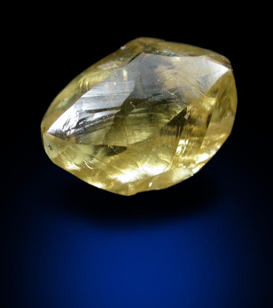 Diamond (1.11 carat cuttable fancy-yellow elongated crystal) from Oranjemund District, southern coastal Namib Desert, Namibia