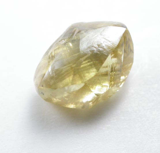 Diamond (1.11 carat cuttable fancy-yellow elongated crystal) from Oranjemund District, southern coastal Namib Desert, Namibia