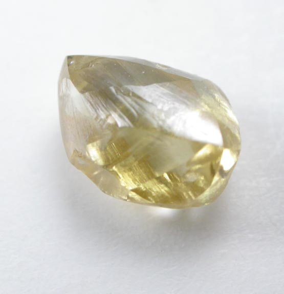 Diamond (1.11 carat cuttable fancy-yellow elongated crystal) from Oranjemund District, southern coastal Namib Desert, Namibia