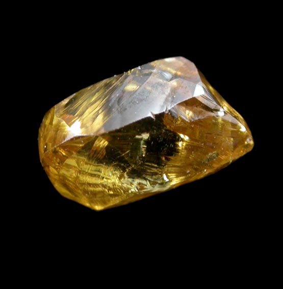 Diamond (0.91 carat cuttable fancy-intense-yellow elongated crystal) from Oranjemund District, southern coastal Namib Desert, Namibia