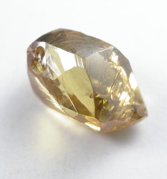 Diamond (0.91 carat cuttable fancy-intense-yellow elongated crystal) from Oranjemund District, southern coastal Namib Desert, Namibia