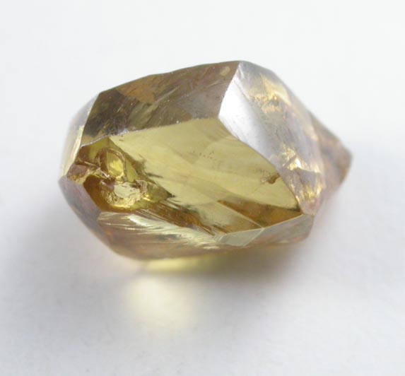 Diamond (0.91 carat cuttable fancy-intense-yellow elongated crystal) from Oranjemund District, southern coastal Namib Desert, Namibia